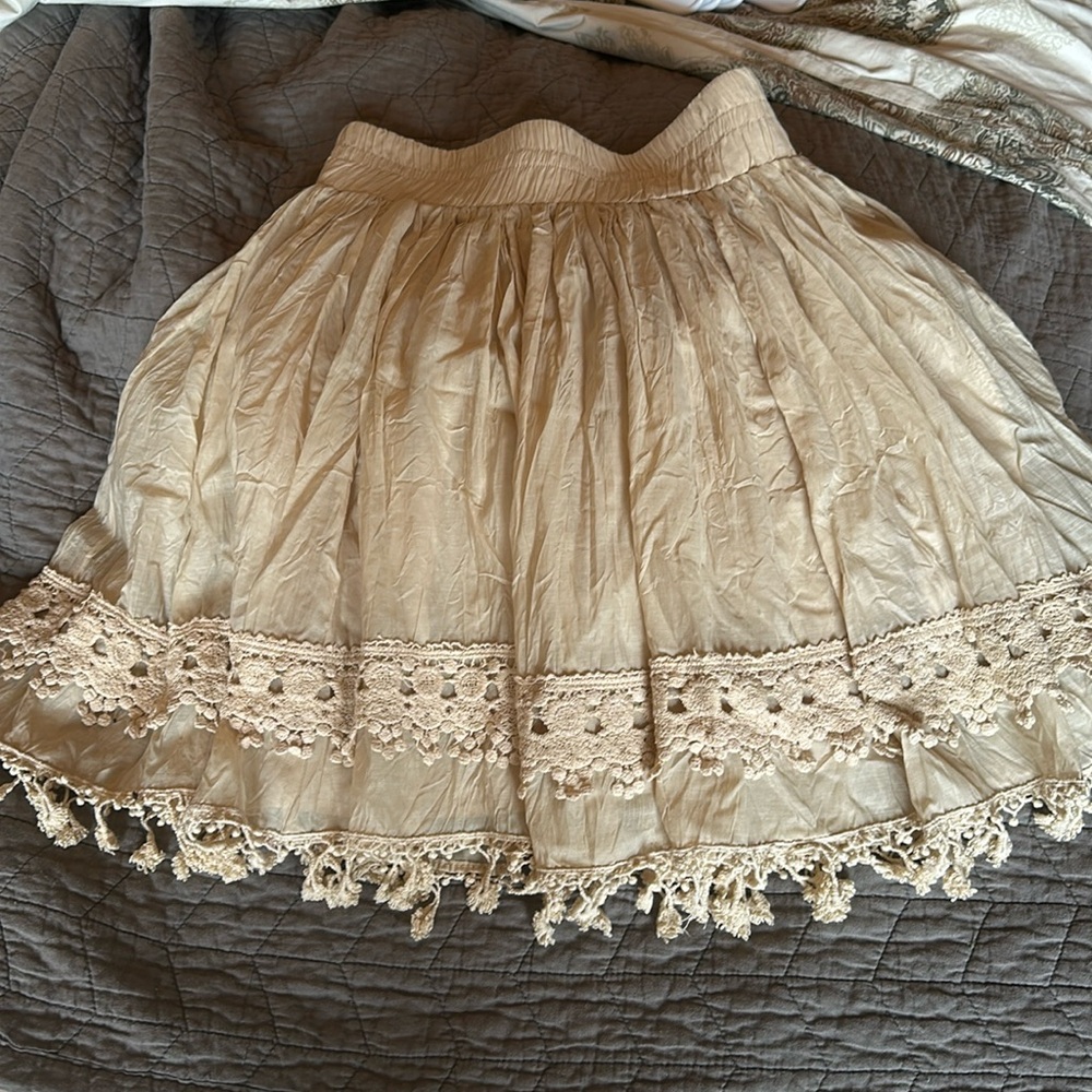 Brand new RYU short skirt. Champagne color.
